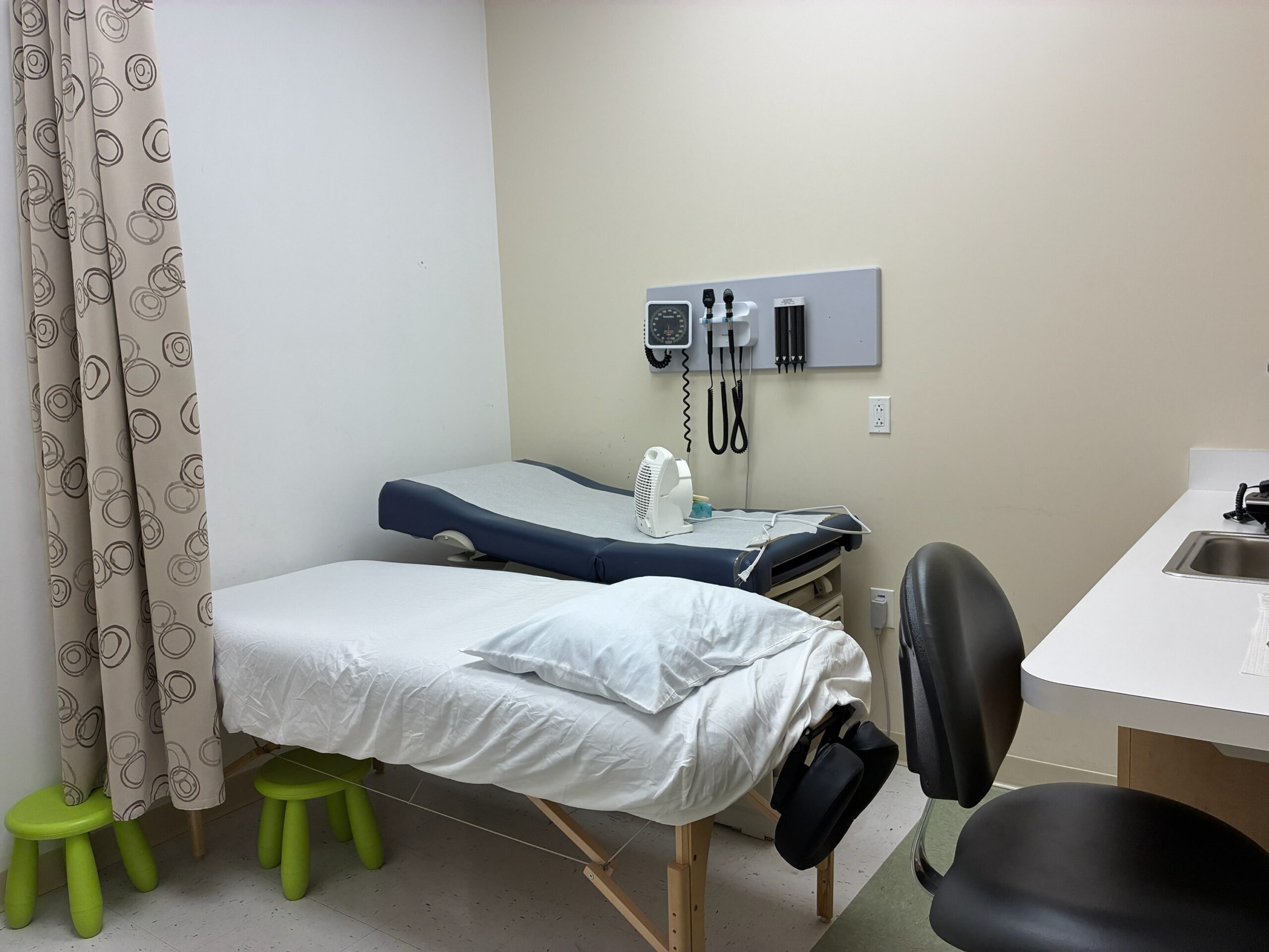 Acupuncture bed in a patient examination room